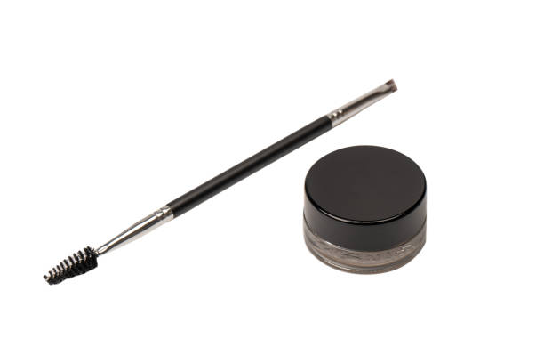 istock A brow pomade in blonde shade with brush isolated on a white background. 1468811404