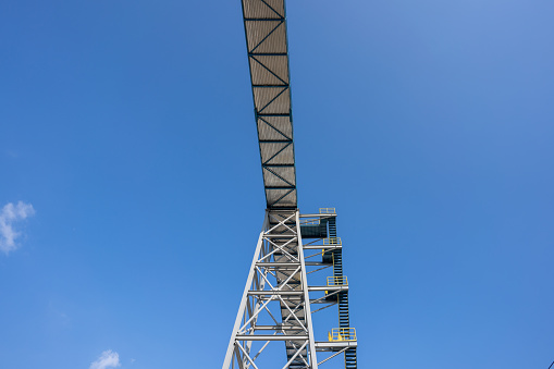 Red Staircase Rests Against Blue Sky. Development Motivation Business Career Growth Concept