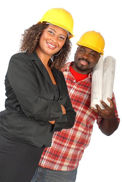 équipe de construction - minority african ethnicity business hardhat photos et images de collection