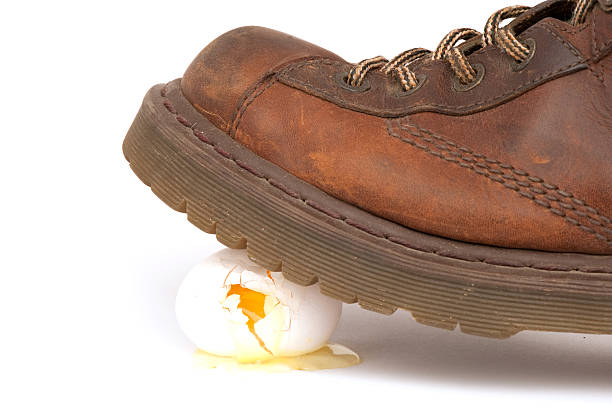 Walking On Egg Shell stock photo