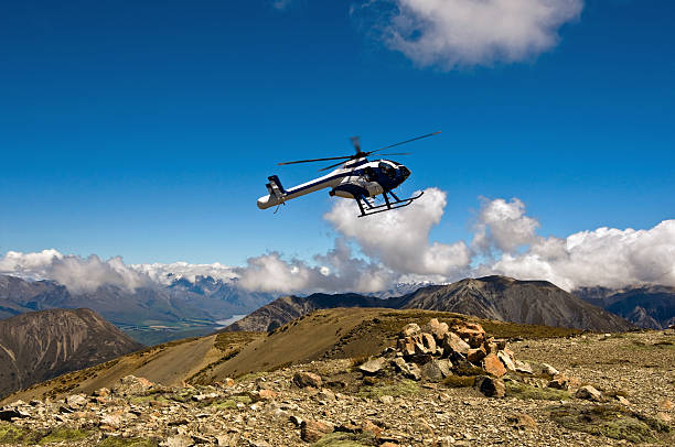 istock Helicopter Landing on a Mountain top. 146881641