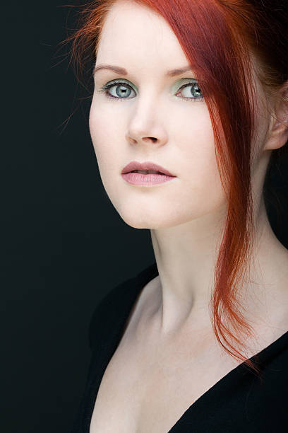 istock Red haired girl looking at camera 146881867