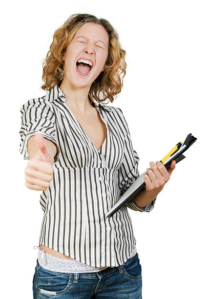 Young beautiful successful businesswoman  with a folder in hand. stock photo