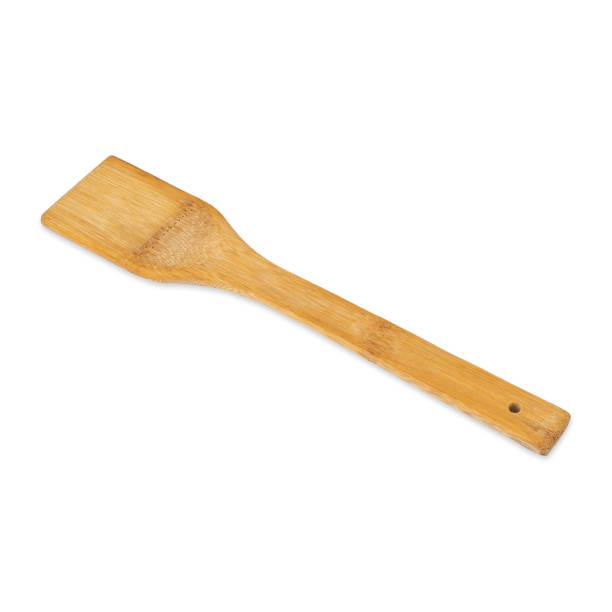 istock Bamboo wooden spatula isolated over white background 1468824448