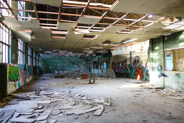 San Claudio, Spain; December 11th 2015: ruined work space with graffiti on the walls in San Claudio abandoned pottery factory