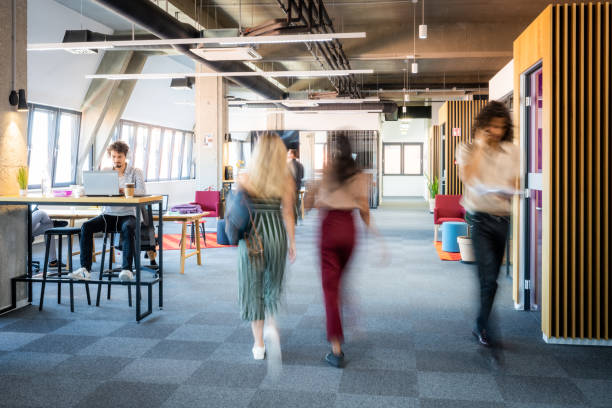 istock Business people walking in office 1468826510