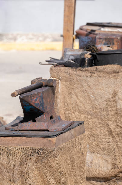 istock An old iron anvil for forging metal in a smithy or forge,old iron tool 1468827183
