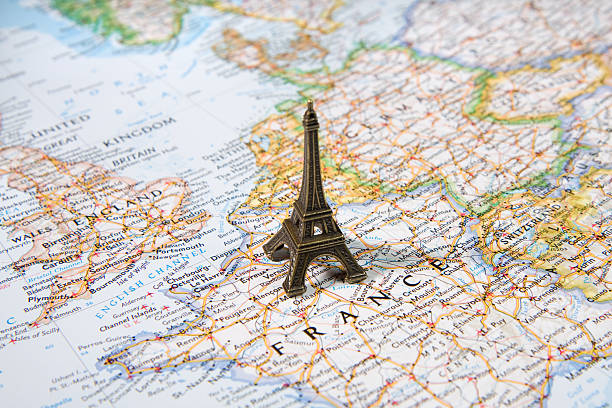 istock Statue of Eiffel Tower on a map, travel destination Paris 146882892