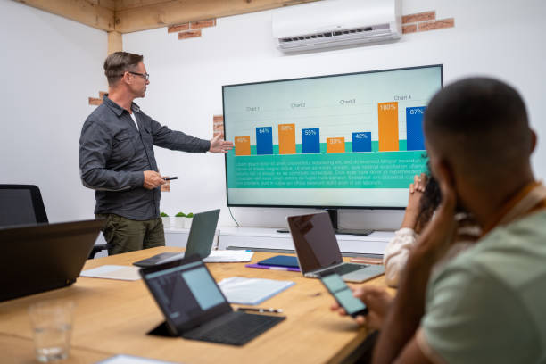 istock Businessman giving presentation with graph 1468829349