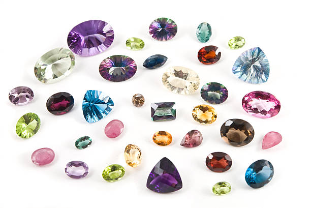 istock Mixed faceted gemstones isolated on white background 146882981
