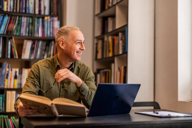 istock Adult male student studying in the library 1468830002