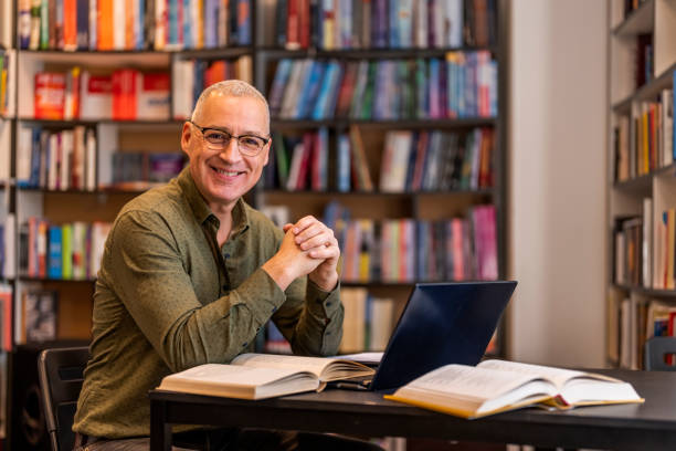 istock Positive mature caucasian male executive at work. 1468830792