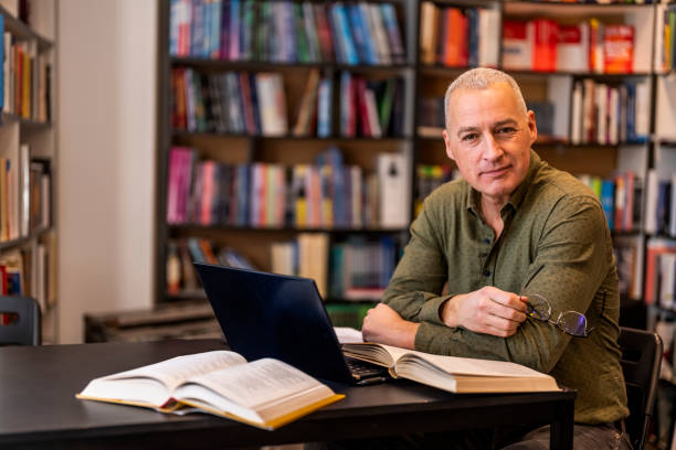 Smiling lawyer sitting at desk in office