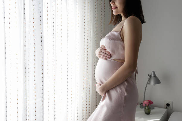 istock Pregnant woman at home. 1468832398