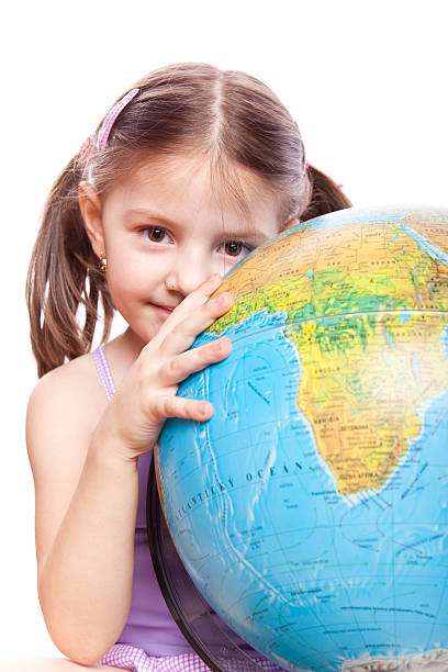 istock Little girl with globe 146883584