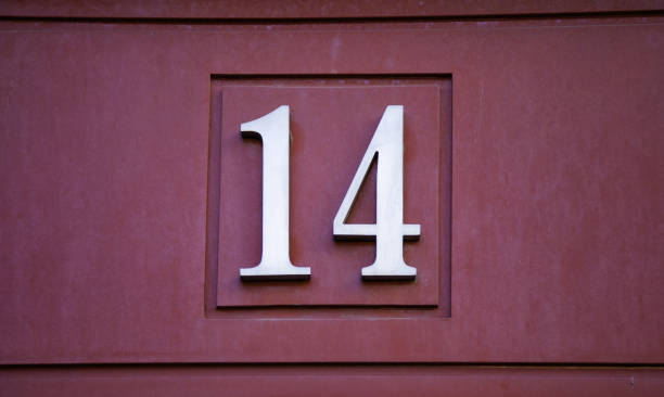 istock Number fourteen on a wall 1468838587