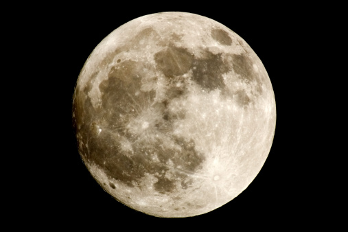 A full moon orbiting earth.