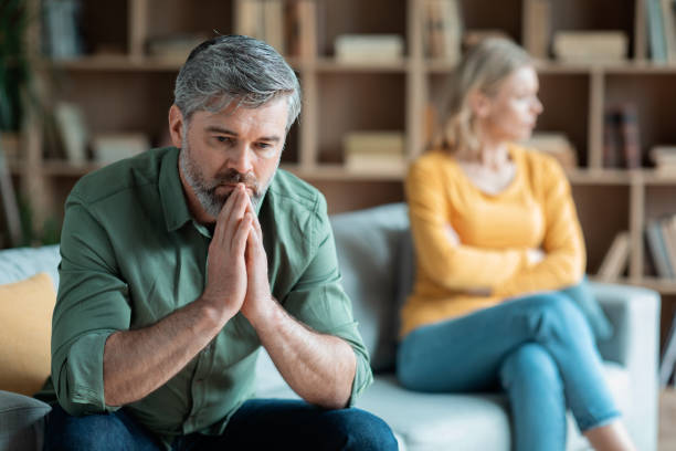 istock Marriage Problems. Middle Aged Wife And Husband Upset After Quarrel At Home 1468844193
