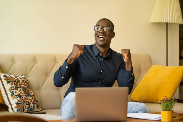 istock An Afro-American man is celebrating his success 1468844395