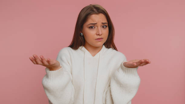 istock Woman raising hands in indignant expression ask why what reason of failure demonstrating disbelief 1468844527