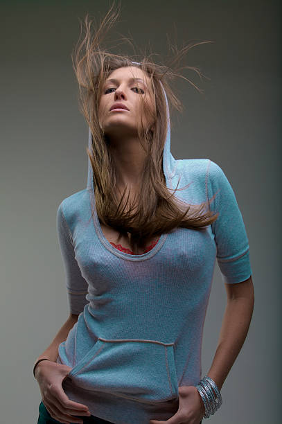 istock Sexy brunette in sweatshirt with windblown hair 146884574