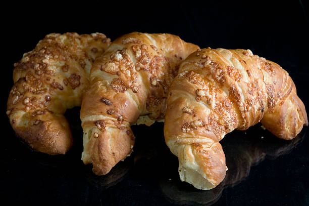 croissant on a black background stock photo