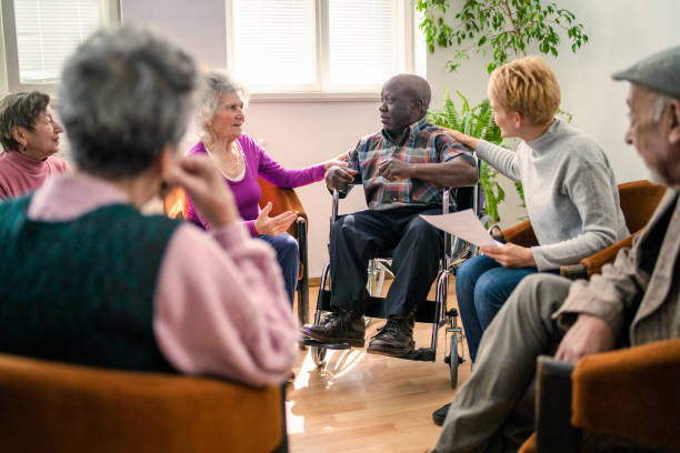 istock Sitting in a circle the  therapy support group meeting 1468847801