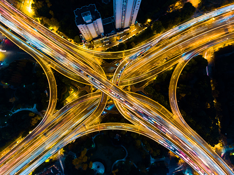 Busy traffic highway at Nanjing east road from aerial view at night time. Shanghai. China