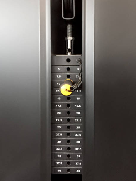 istock Weight training. Exercise machine weights. Weight stack at fitness 1468851779