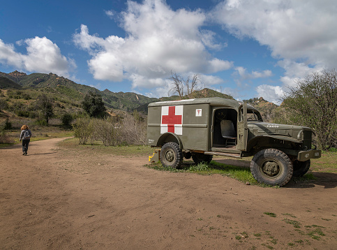 February 22, 2023, Calabasas, CA, USA: An old Army ambulance, used on the tv show MASH, lies abandoned on the old set at Malibu Creek State Park in Calabasas, CA.