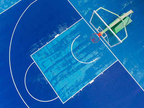 Top view of the basketball court in Shanghai. Old blue court aerial view