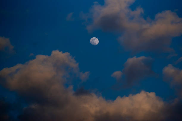 istock landscape early morning sky moon and clouds on a blue background 1468860345