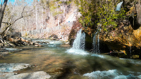 Cedar Creek Waterfall that Leads to the Natural Bridge - Rockbridge County Virginia State Park Trail  - Camera Moving Backwards
