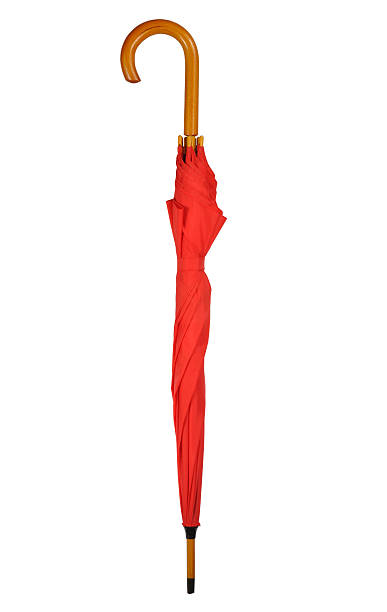 istock A closed vertical red umbrella with a curved handle on white 146886338