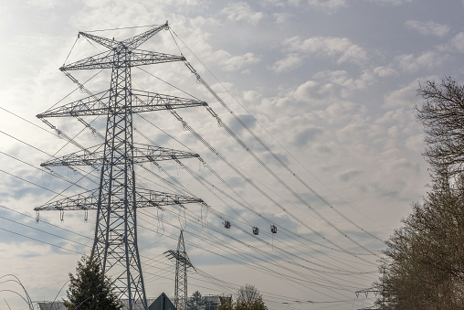 A newly installed high-voltage pylon with some cables connectedfrankfurt am main, germany-february 22, 2023: