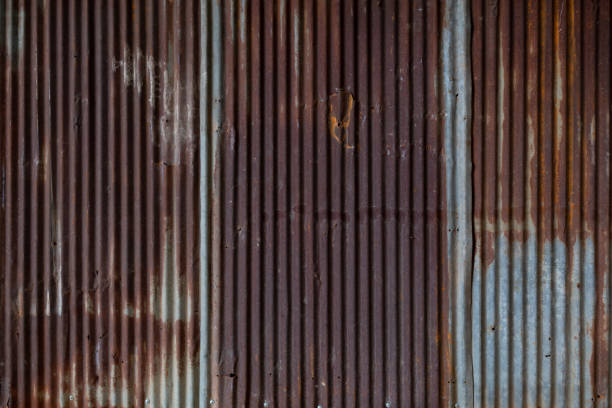 istock background pattern of rust that eats on the corrugated galvanized sheet used to make the house fence is caused by the weather outside reacting with the galvanized sheet until it corrodes from rust. 1468869266