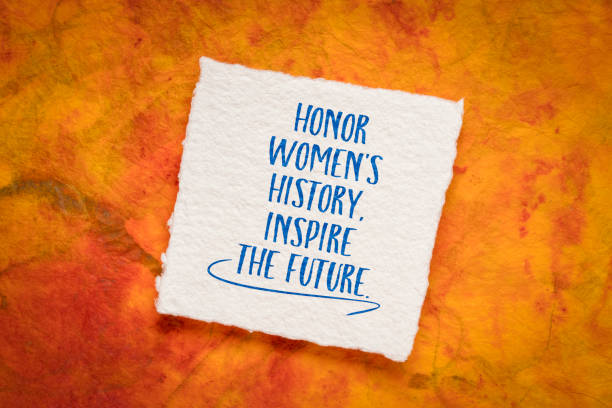 Honor women's history, inspire the future, inspirational handwriting stock photo