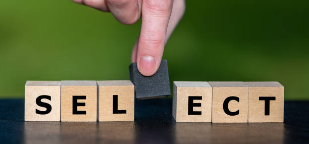 istock Wooden cubes form the word select. 1468873362