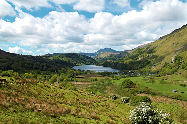 The Nant Gwynant Valley Ultra-wide angle view of the Nant Gwynant Valley and Llyn Gwynant from the A498 road llyn gwynant stock pictures, royalty-free photos & images