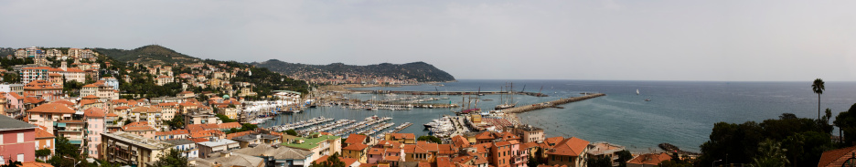 Panoramic view of the city of Imperia during a classic sail meeting. Liguria, Italy