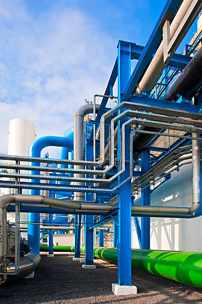 Air-separating factory with blue and green pipes and support stock photo