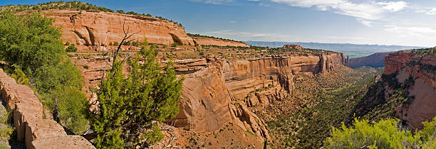 Colorado National Monument Wide-angle shot of a dramatic valley in the Colorado National Monument. fruita colorado stock pictures, royalty-free photos & images