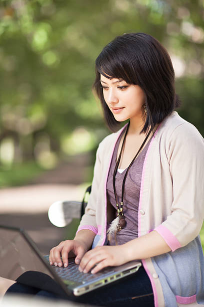 istock Mixed race college student with laptop 146888256
