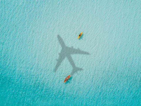 Airplane flying over the sea