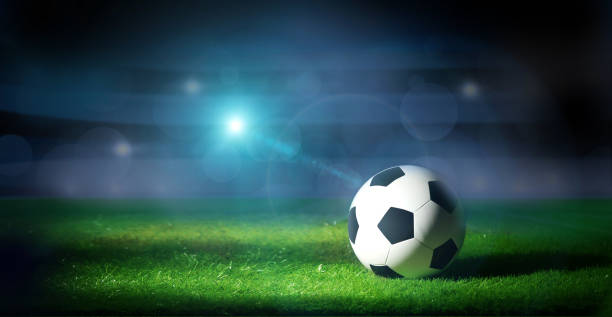 istock Soccer ball on the grass. Sport background. 1468886977
