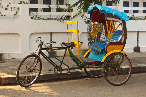Chennai, India - October 17, 2023. An autorickshaw is parked on the side of the road in Chennai.