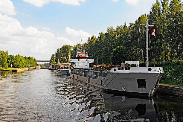 Ships in Saimaa Canal Ships before first Saimaa Canal shipping lock. Saimaa, Finland saimaa stock pictures, royalty-free photos & images