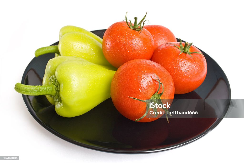 Paprika und Tomaten - Lizenzfrei Abnehmen Stock-Foto