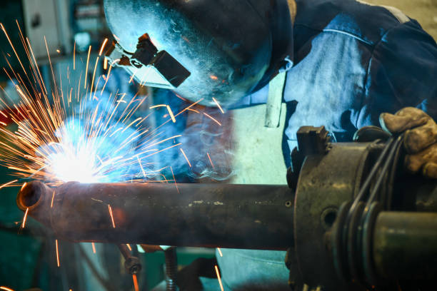 istock Welding and repairing a hydraulic arm 1468900236