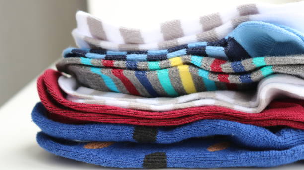 istock children's colorful socks on a white surface as a background 1468900909